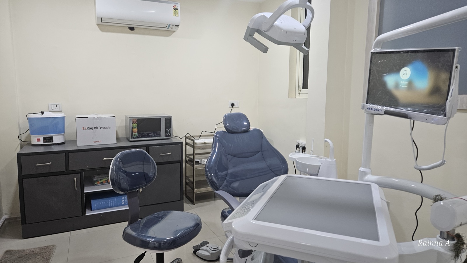Dental services room with modern dental chair and equipment